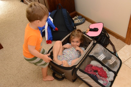 Climbing in Mommy s Suitcase1
